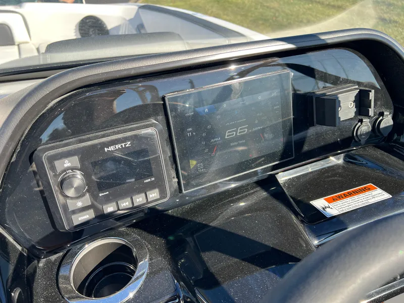 Slide: The Image of Dashboard of 2025 Yamaha Boats 195S with digital display and controls. - 12
