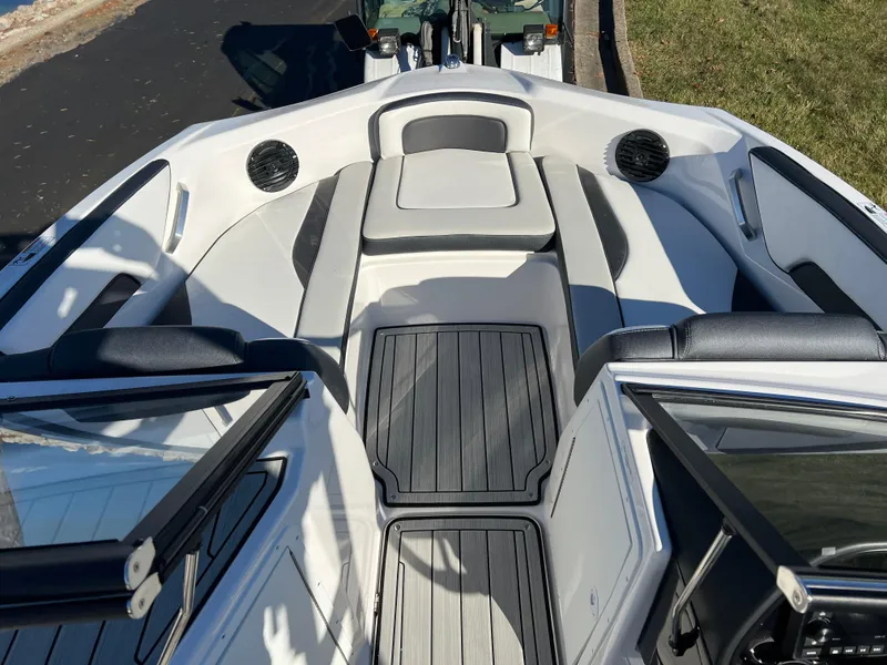 Slide: The Image of 2025 Yamaha Boats 195S interior with sleek seating and modern design. - 13