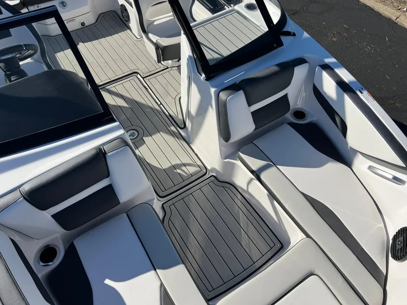 Slide: The Image of 2025 Yamaha Boats 195S interior with sleek seating and modern design. - 14