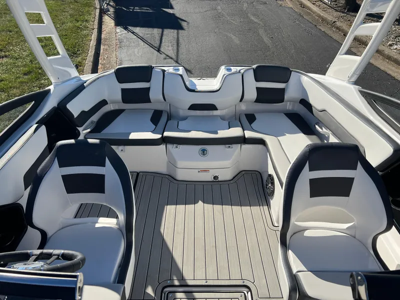 Slide: The Image of 2025 Yamaha Boats 195S interior with sleek seating and modern design. - 16