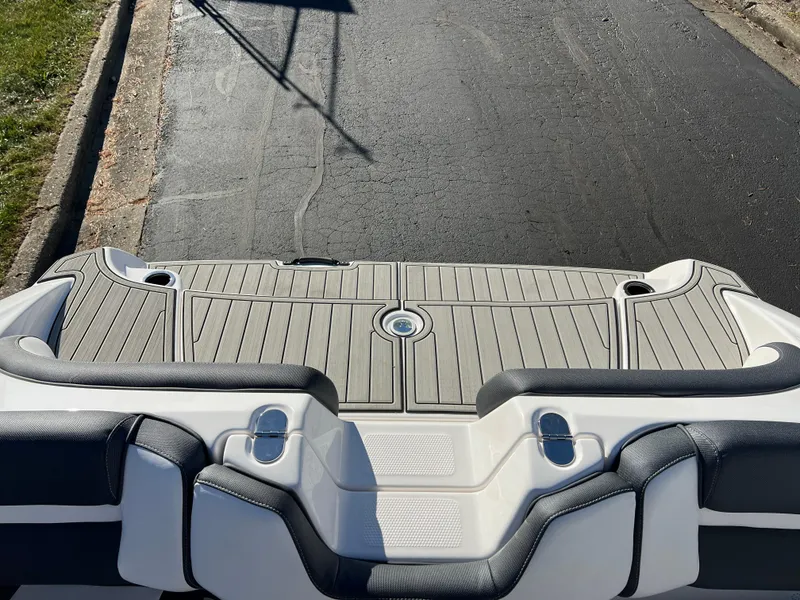 Slide: The Image of 2025 Yamaha Boats 195S rear deck with sleek design and modern features. - 18