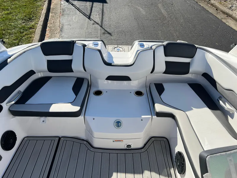 Slide: The Image of 2025 Yamaha Boats 195S interior with sleek seating and modern design. - 19