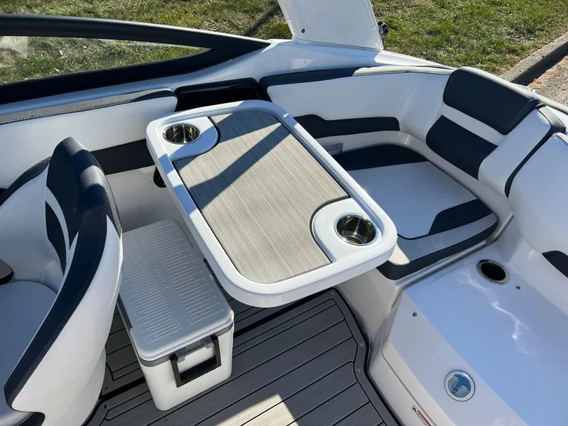 Slide: The Image of 2025 Yamaha Boats 195S interior with seating and table setup. - 22