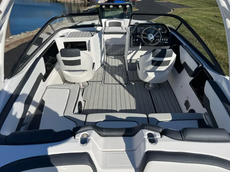 Slide: The Image of 2025 Yamaha Boats 195S interior with sleek seating and modern dashboard design. - 8