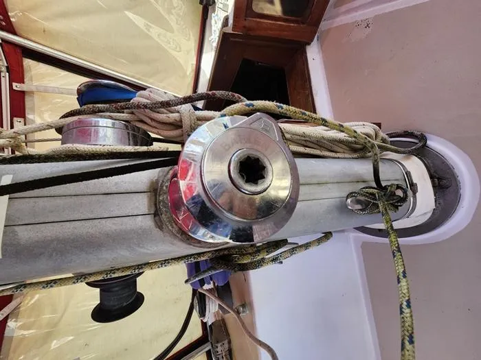 Slide: The Image of Close-up of 1983 Morgan Schooner mast with ropes and winch. - 39