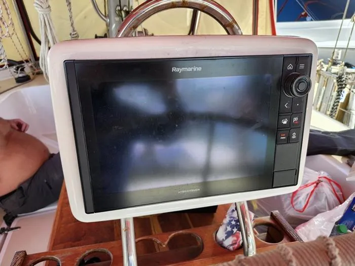 Slide: The Image of Raymarine navigation system on 1983 Morgan Schooner sailboat, cockpit view. - 6