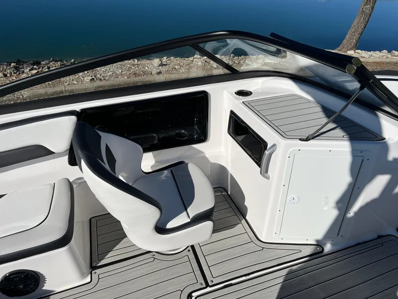 Slide: The Image of 2025 Yamaha Boats 195S interior with sleek seating and modern dashboard design. - 11
