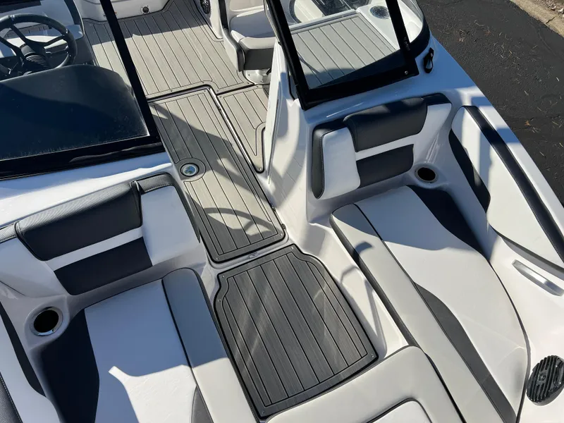 Slide: The Image of 2025 Yamaha Boats 195S interior with sleek seating and modern design. - 15