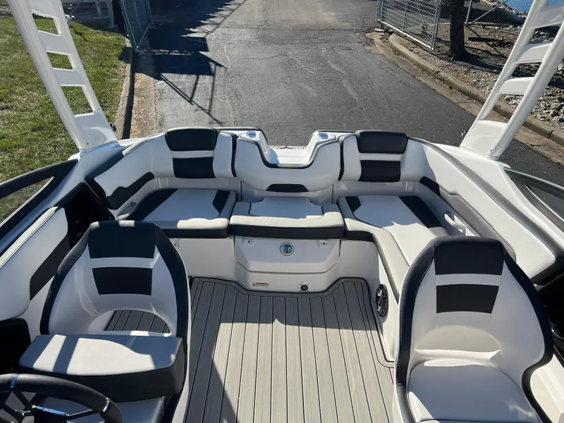 Slide: The Image of 2025 Yamaha Boats 195S interior with sleek seating and modern design. - 17