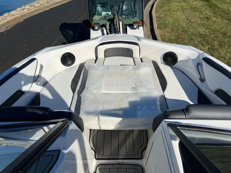 Slide: The Image of 2025 Yamaha Boats 195S interior with sleek seating and modern design. - 23