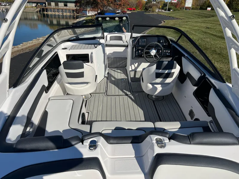 Slide: The Image of 2025 Yamaha Boats 195S interior with sleek seating and modern dashboard design. - 8