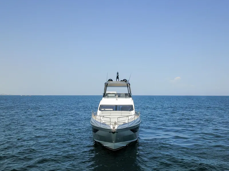 Slide: The Image of 2023 Azimut Fly 68 yacht on open sea, front view. - 10