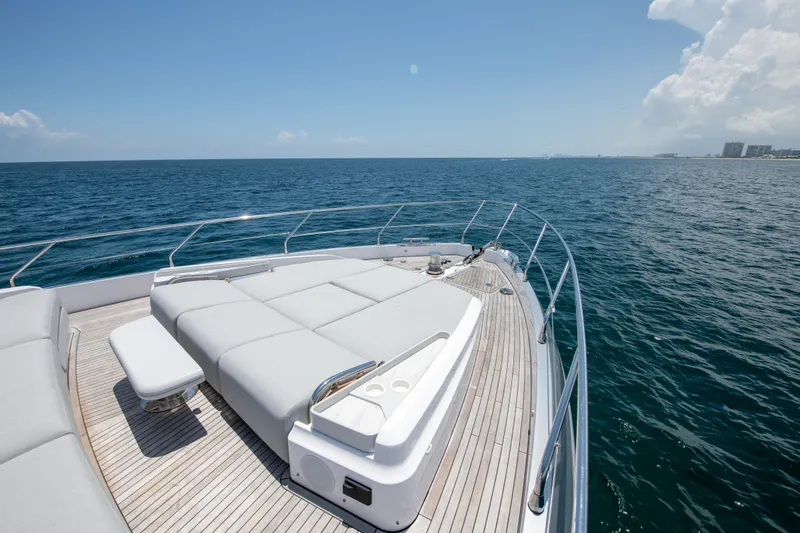 Slide: The Image of 2023 Azimut Fly 68 yacht deck with luxurious seating, ocean view. - 12