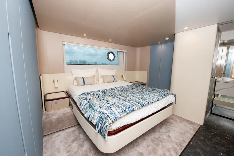 Slide: The Image of Luxurious bedroom interior of 2023 Azimut Fly 68 yacht with modern design. - 2