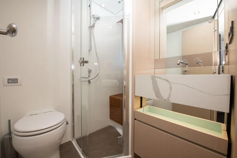 Slide: The Image of Luxurious bathroom in 2023 Azimut Fly 68 yacht with modern shower and sleek fixtures. - 23