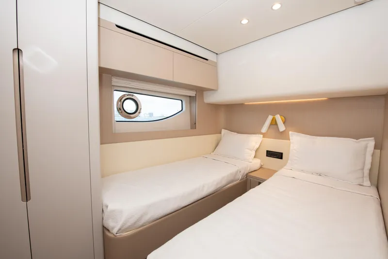 Slide: The Image of Luxurious twin cabin interior of 2023 Azimut Fly 68 yacht. - 24