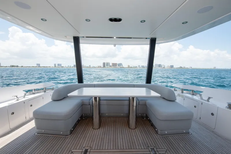 Slide: The Image of Luxurious 2023 Azimut Fly 68 yacht deck with ocean view and seating area. - 27
