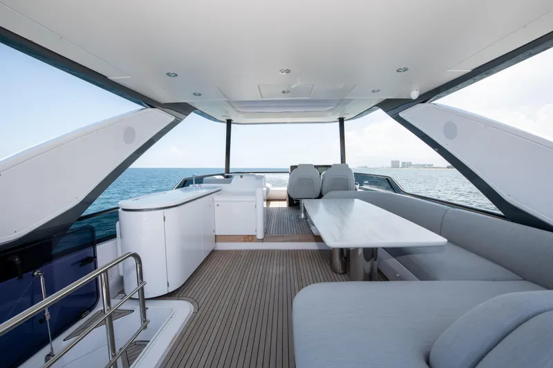 Slide: The Image of Luxurious 2023 Azimut Fly 68 yacht interior with elegant seating and ocean view. - 35