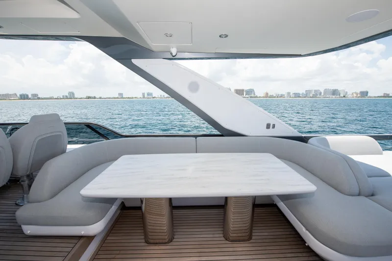 Slide: The Image of Luxurious seating area on 2023 Azimut Fly 68 yacht with ocean view. - 36