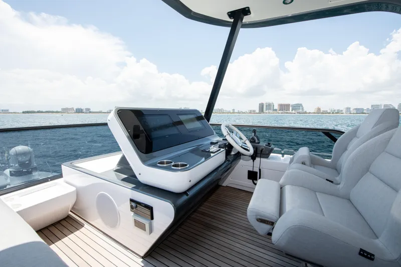 Slide: The Image of Luxurious 2023 Azimut Fly 68 yacht cockpit with modern controls and ocean view. - 40