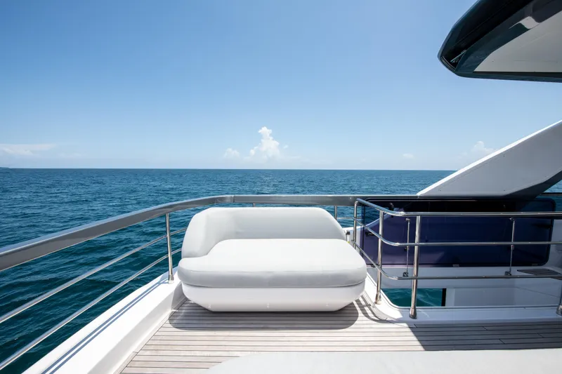 Slide: The Image of Luxurious 2023 Azimut Fly 68 yacht deck with ocean view and modern seating. - 45