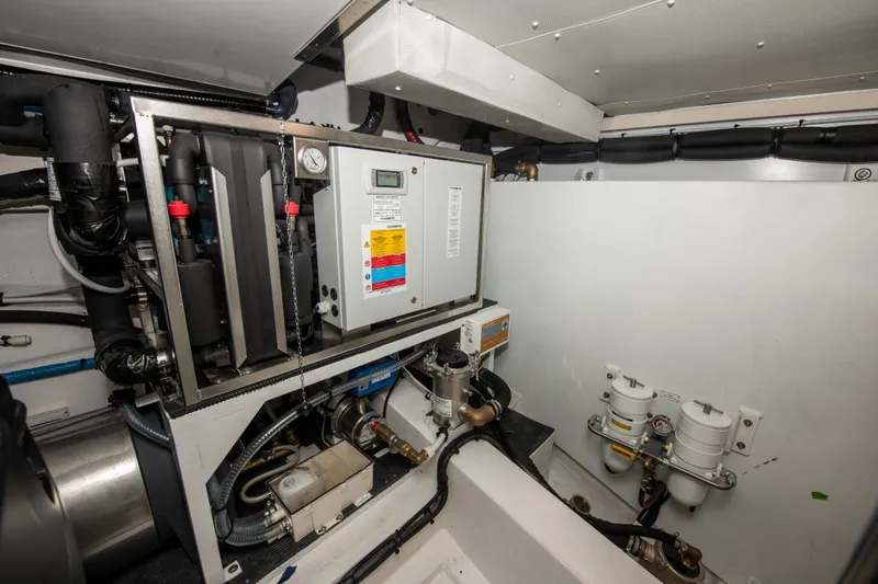 Slide: The Image of Engine room of 2023 Azimut Fly 68 yacht, showcasing advanced machinery and equipment. - 47