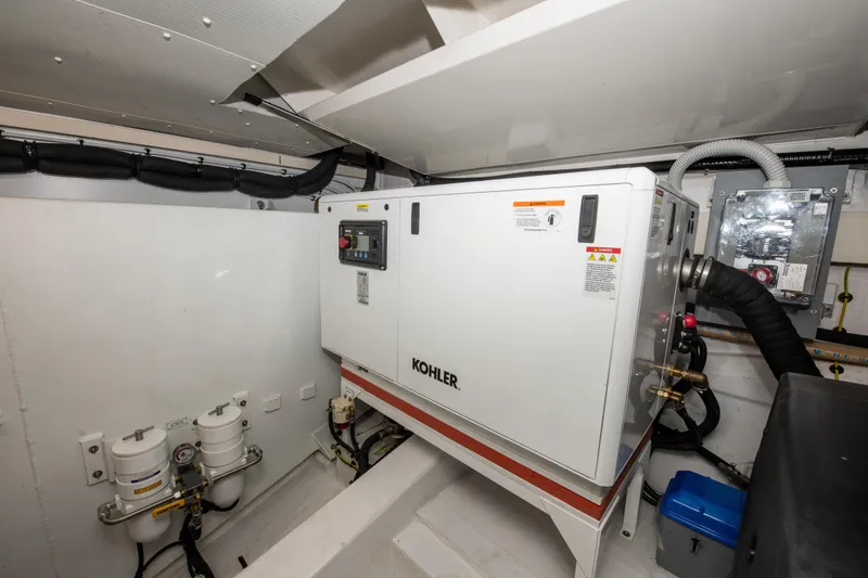 Slide: The Image of Engine room of 2023 Azimut Fly 68 yacht with Kohler generator. - 48