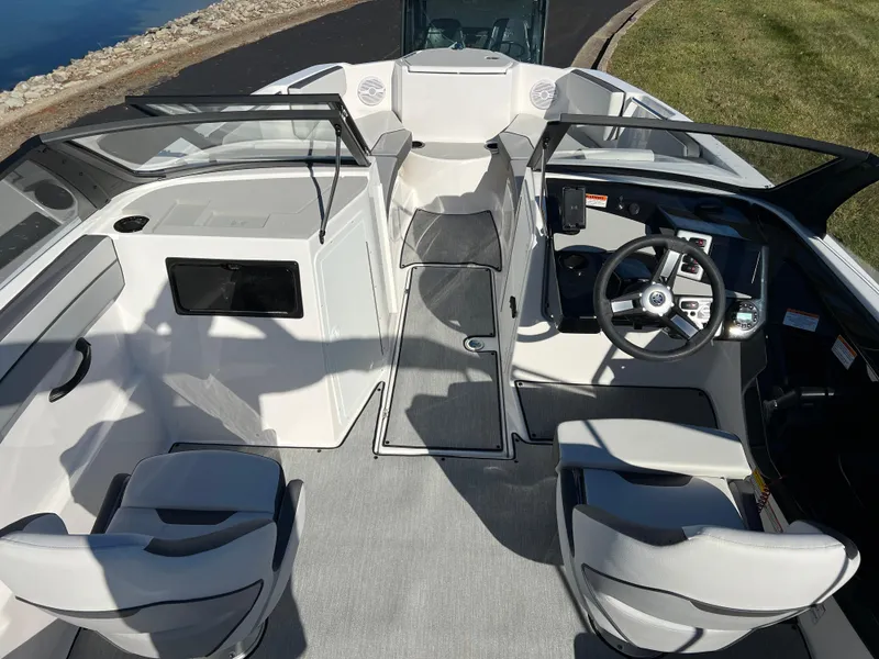 Slide: The Image of 2025 Yamaha Boats SX220 interior with sleek design and modern controls. - 11