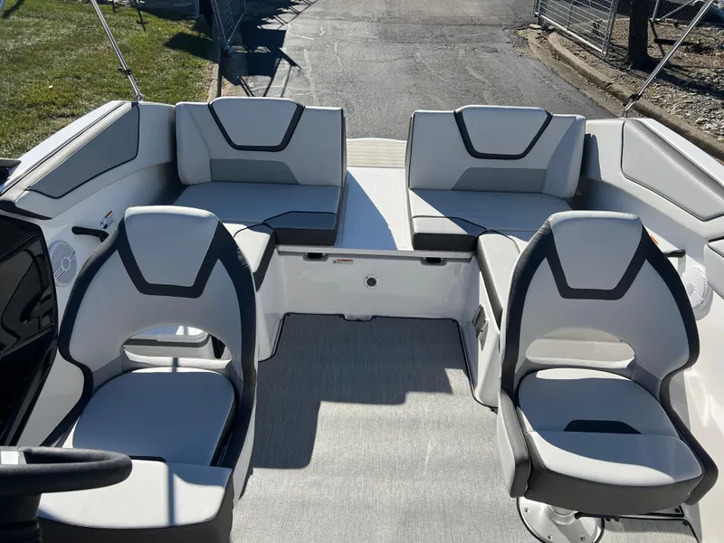 Slide: The Image of 2025 Yamaha Boats SX220 interior with modern seating and sleek design. - 19