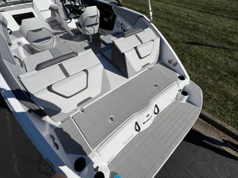 Slide: The Image of 2025 Yamaha Boats SX220 interior with sleek seating and modern design. - 8