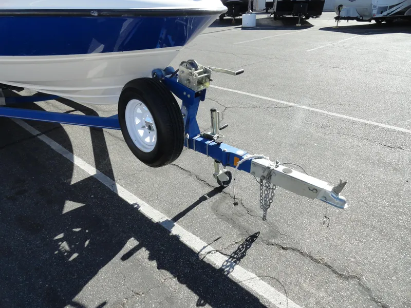 Slide: The Image of 2006 Bayliner 195 Bowrider on trailer, parked in a lot. - 17