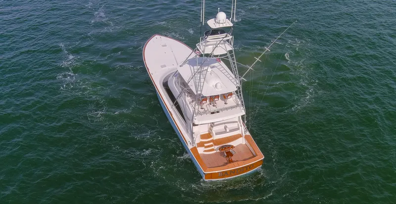Slide: The Image of Aerial view of 2015 Viking 70 Convertible yacht cruising on open water. - 29