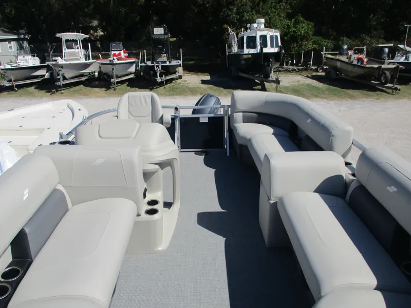 Slide: The Image of 2025 Starcraft LX16R pontoon boat with spacious seating and modern design. - 4