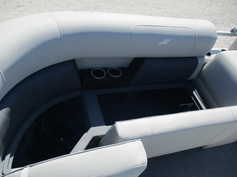 Slide: The Image of Starcraft LX16R 2025 boat interior with gray seating and cup holders. - 7