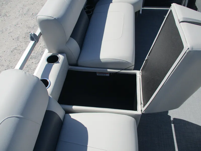 Slide: The Image of Starcraft LX16R 2025 boat seating with storage compartment and cup holders. - 9