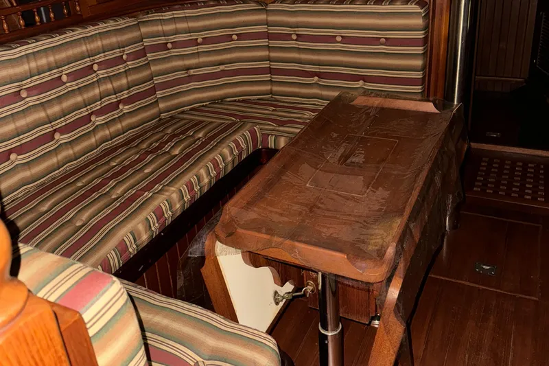 Slide: The Image of 1984 Young Sun 35 sailboat in storage, with inflatable dinghy underneath. - 10