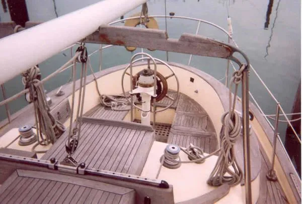 Slide: The Image of 1984 Young Sun 35 sailboat deck with ropes and hatch. - 3
