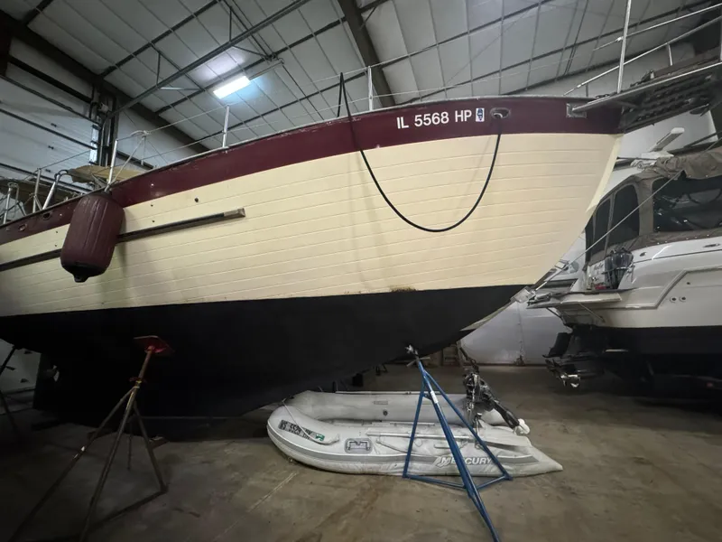 Slide: The Image of 1984 Young Sun 35 sailboat in storage, front view. - 9