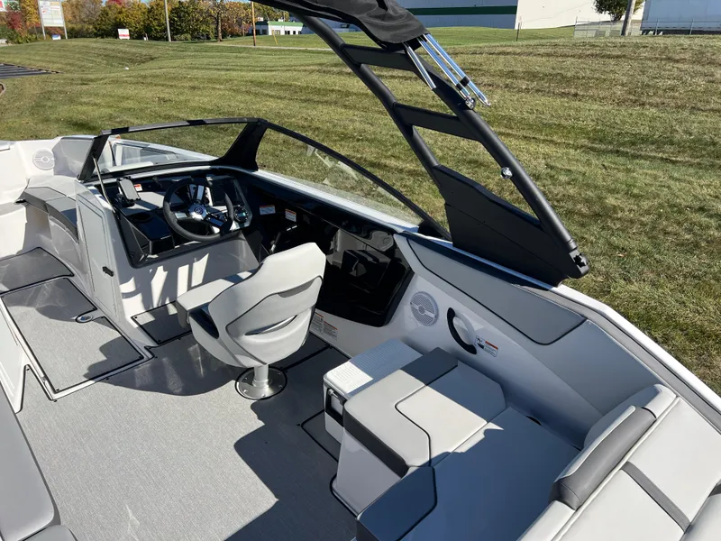 Slide: The Image of 2025 Yamaha Boats AR220 interior with sleek design and modern controls. - 12
