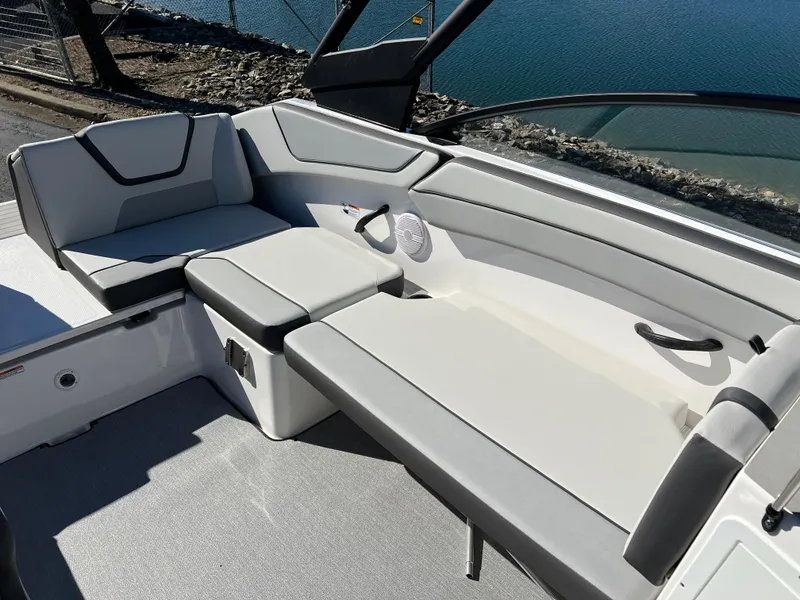 Slide: The Image of 2025 Yamaha Boats AR220 interior seating with modern design and comfortable upholstery. - 21
