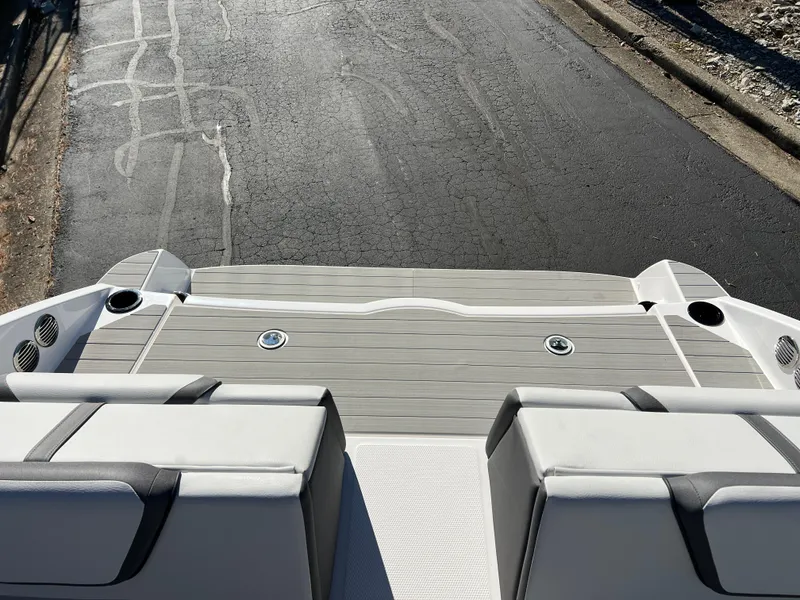 Slide: The Image of 2025 Yamaha Boats AR220 rear deck with seating, viewed from above. - 23