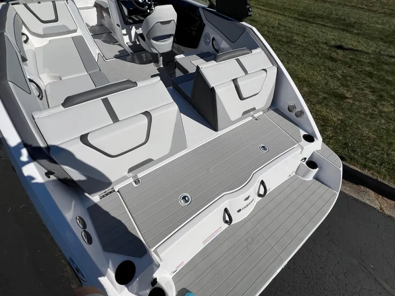 Slide: The Image of 2025 Yamaha Boats AR220 interior with sleek seating and modern design. - 8