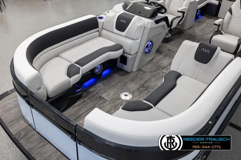 Slide: The Image of 2025 Avalon Catalina QL boat interior with modern seating and blue LED lighting. - 10