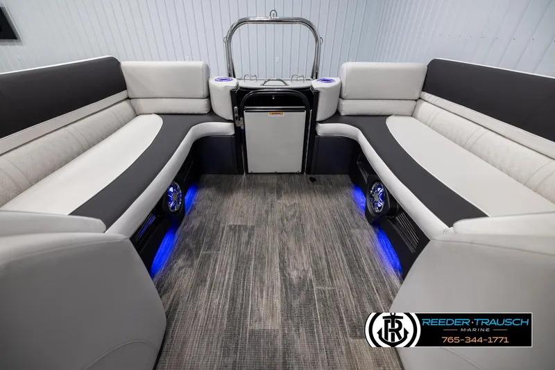Slide: The Image of 2025 Avalon Catalina QL interior with modern seating and ambient blue lighting. - 15