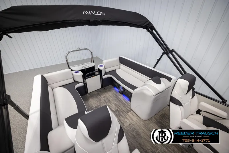 Slide: The Image of 2025 Avalon Catalina QL pontoon boat interior with modern seating and canopy. - 23