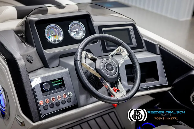 Slide: The Image of 2025 Avalon Catalina QL dashboard with steering wheel and control panel. - 28