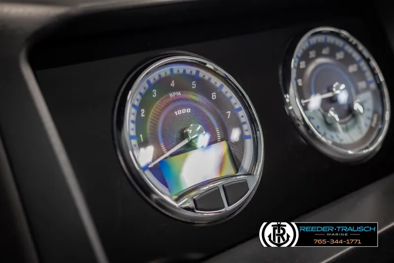 Slide: The Image of Close-up of 2025 Avalon Catalina QL dashboard gauges, featuring RPM and speedometer. - 31