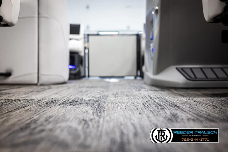 Slide: The Image of Interior view of 2025 Avalon Catalina QL boat with modern flooring and seating. - 40