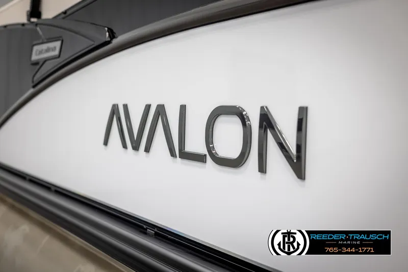 Slide: The Image of 2025 Avalon Catalina QL boat side view with logo and Reeder-Trausch Marine branding. - 44