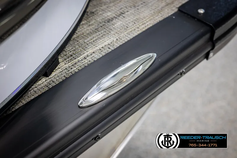 Slide: The Image of 2025 Avalon Catalina QL boat detail with sleek chrome accent and textured surface. - 47